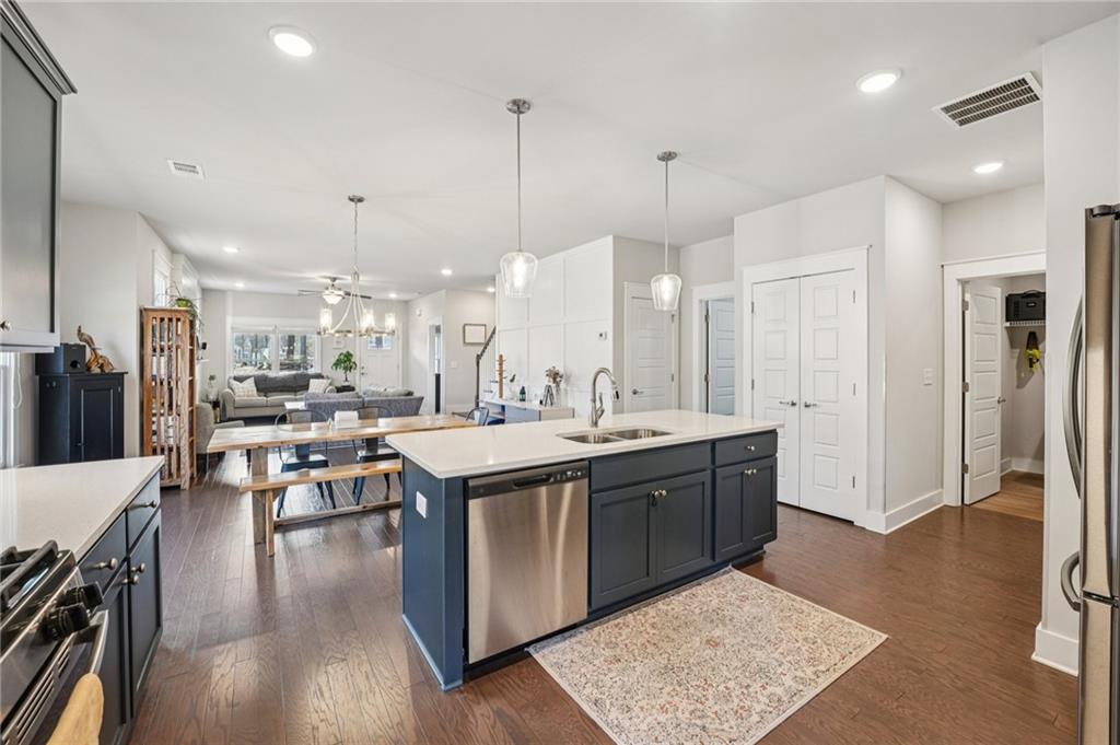 5175 North Pratt Street Covington, GA 30014 - Photo 24 of 52 a large kitchen with lots of counter top space and stainless steel appliances