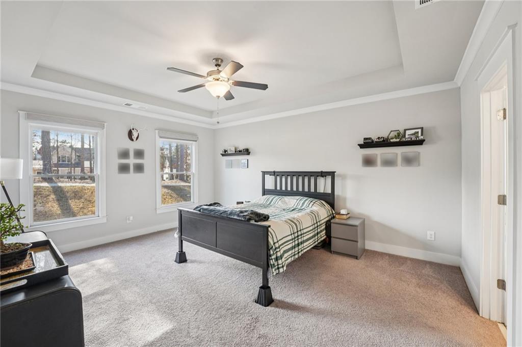 5175 North Pratt Street Covington, GA 30014 - Photo 29 of 52 a bedroom with a bed and a window