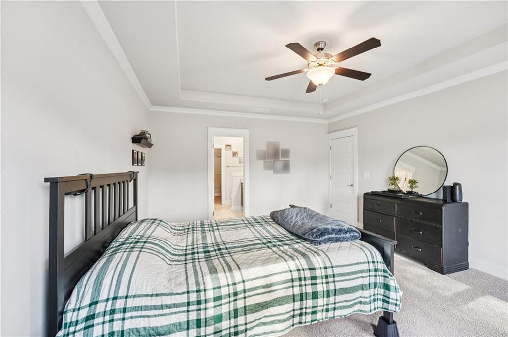 5175 North Pratt Street Covington, GA 30014 - Photo 31 of 52 a bedroom with a bed and window