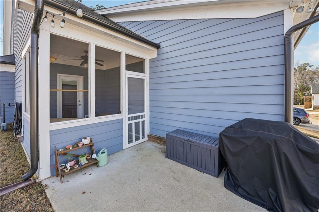 5175 North Pratt Street Covington, GA 30014 - Photo 48 of 52 a view of front door and deck of the house