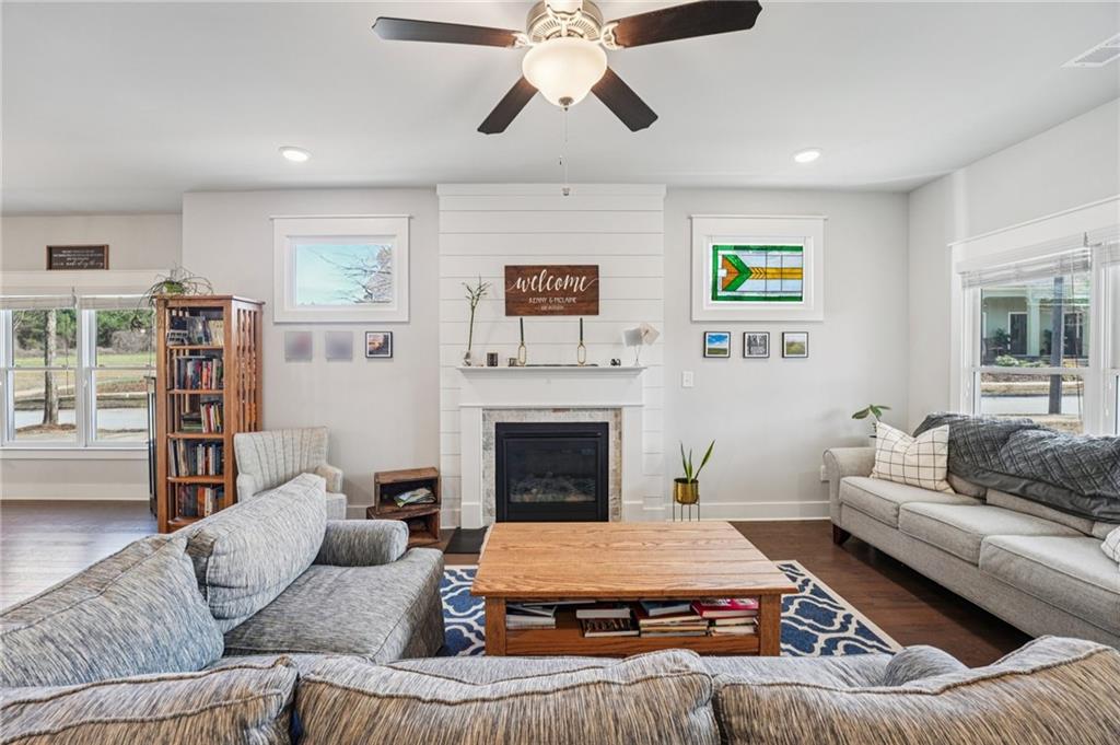 5175 North Pratt Street Covington, GA 30014 - Photo 9 of 52 a living room with furniture and a fireplace