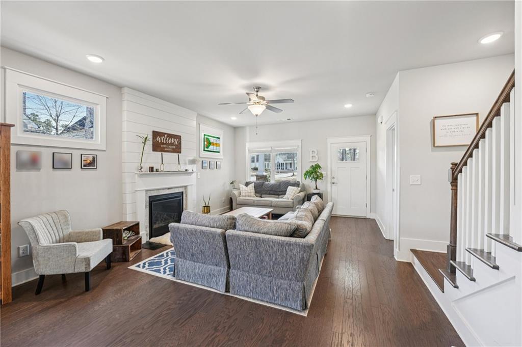 5175 North Pratt Street Covington, GA 30014 - Photo 10 of 52 a living room with furniture and a fireplace