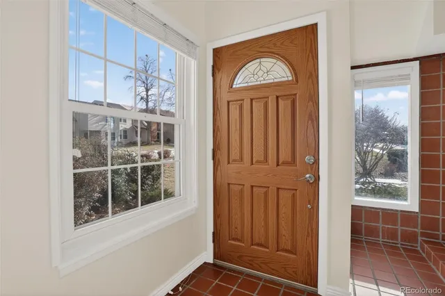 a view of a door and a window