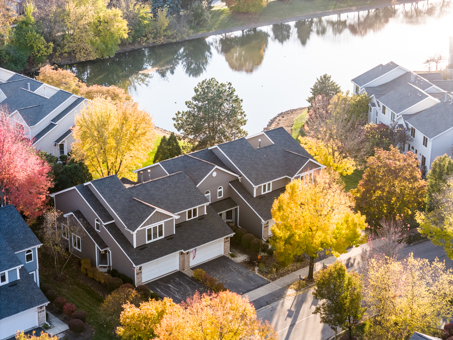 1068 Mattande Lane Naperville, IL 60540 - Photo 3 of 37 a view of a house with a yard and a large tree