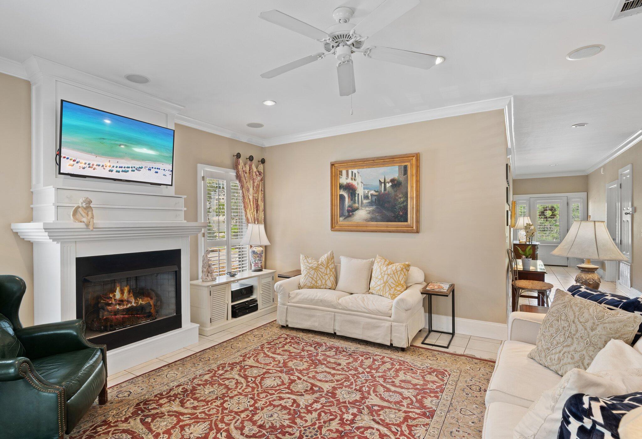 64 Spotted Dolphin Road Santa Rosa Beach, FL 32459 - Photo 2 of 43 a living room with furniture and a fireplace