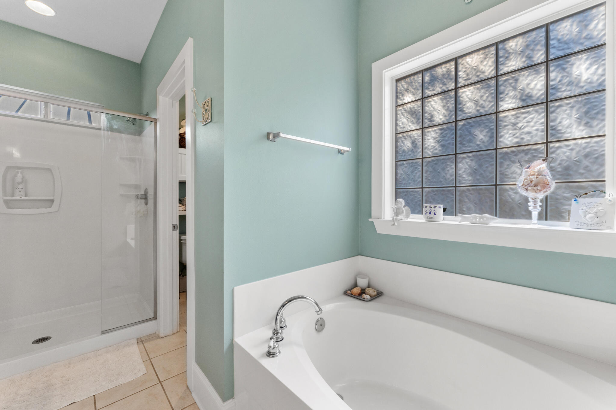 64 Spotted Dolphin Road Santa Rosa Beach, FL 32459 - Photo 22 of 43 a bathroom with a tub and shower