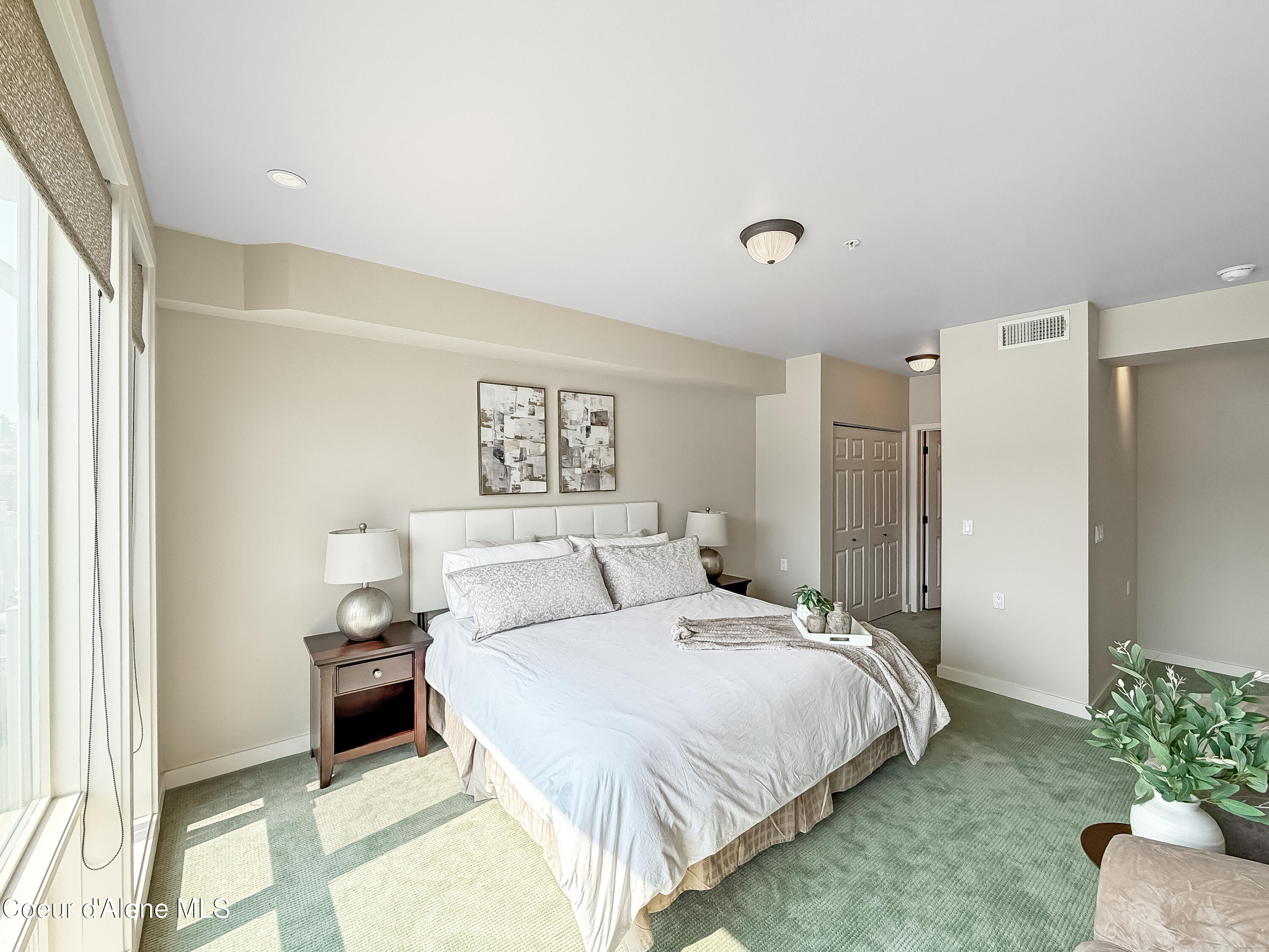 415 West Waterside Drive, Unit 404 Post Falls, ID 83854 - Photo 14 of 25 Primary Bedroom