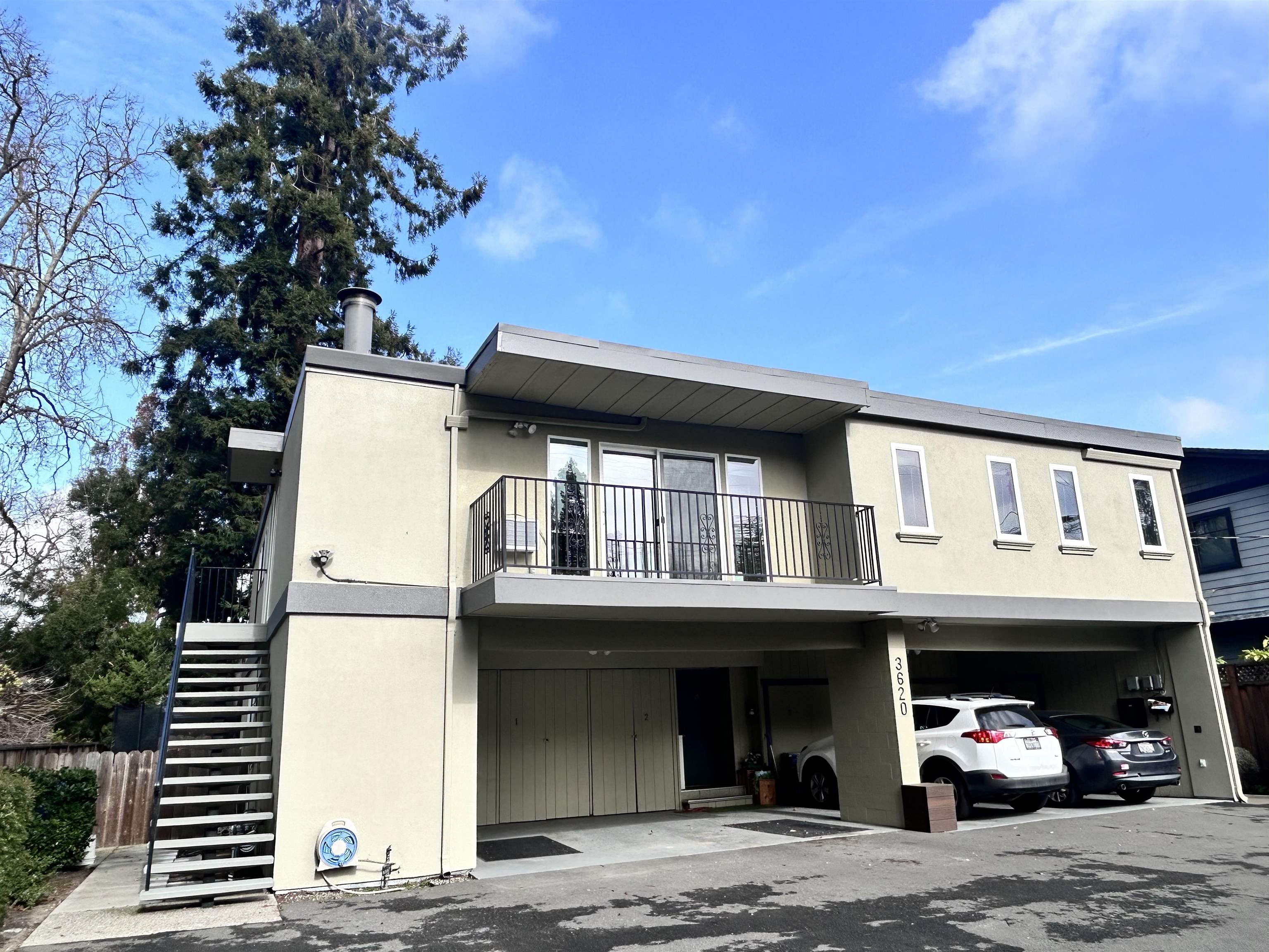 3620 Walnut Street, Unit B Lafayette, CA 94549 - Photo 1 of 26 View of front facade with a balcony and stucco siding