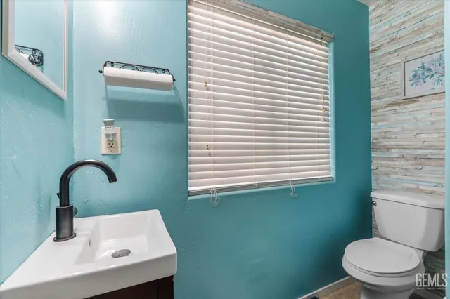 a bathroom with a sink and a toilet