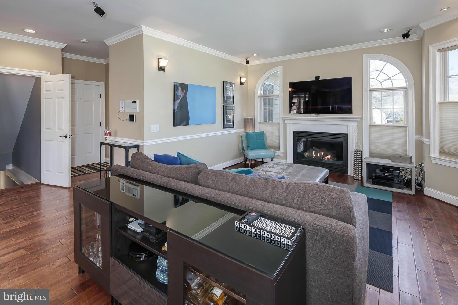 1103 Reames Road Baltimore, MD 21220 - Photo 11 of 30 Lots of natural light, recessed lights, and gas FP