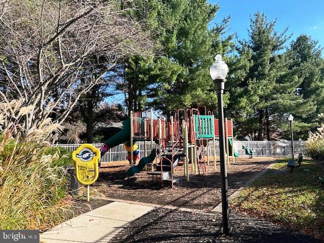 4828 Stone Shop Circle, Unit 4828 Owings Mills, MD 21117 - Photo 16 of 18 a view of a park with iron fence