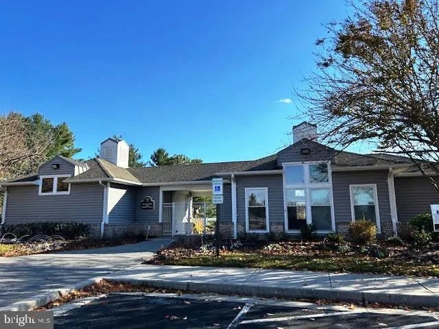 a sign that is on a brick wall