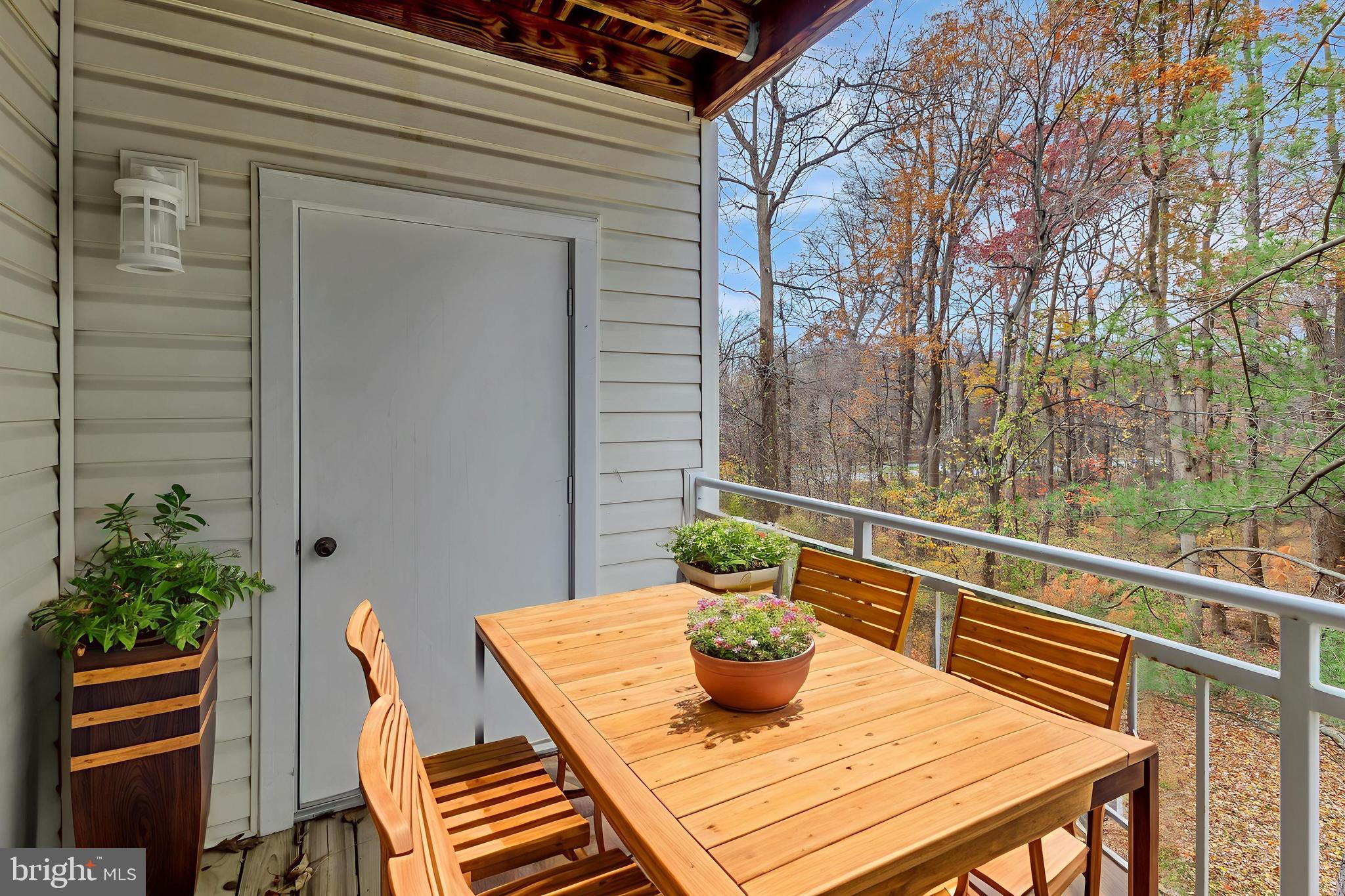 4828 Stone Shop Circle, Unit 4828 Owings Mills, MD 21117 - Photo 2 of 18 a view of deck and patio