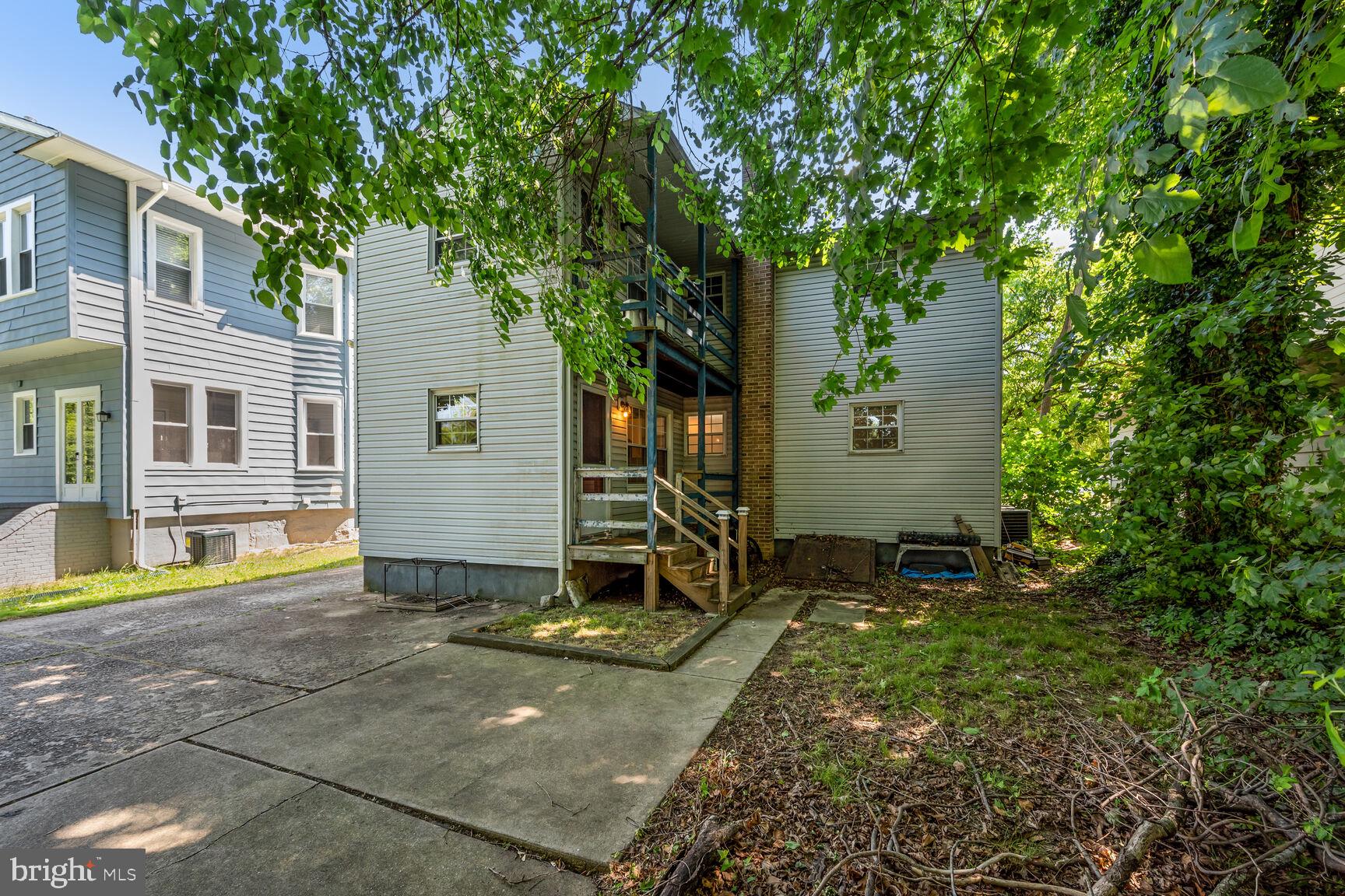 430 Richey Avenue, Unit 1A Oaklyn, NJ 08107 - Photo 12 of 13 Charming home nestled in lush greenery.