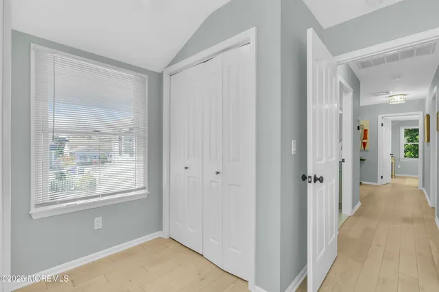 a view of a livingroom with a furniture and a window