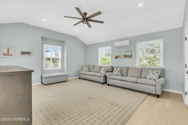 a bathroom with a shower and mirror