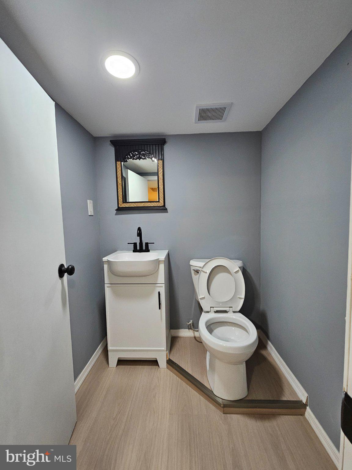 53 West 4th Street New Castle, DE 19720 - Photo 8 of 21 Sleek, modern half-bath retreat.