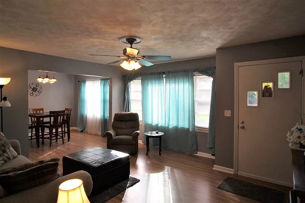 4317 Byron Street Columbus, GA 31907 - Photo 12 of 28 a view of a livingroom with furniture window and wooden floor