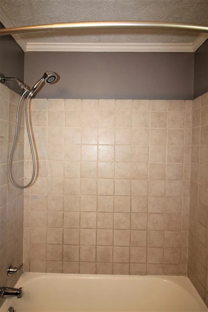 4317 Byron Street Columbus, GA 31907 - Photo 16 of 28 a bathroom with a bathtub