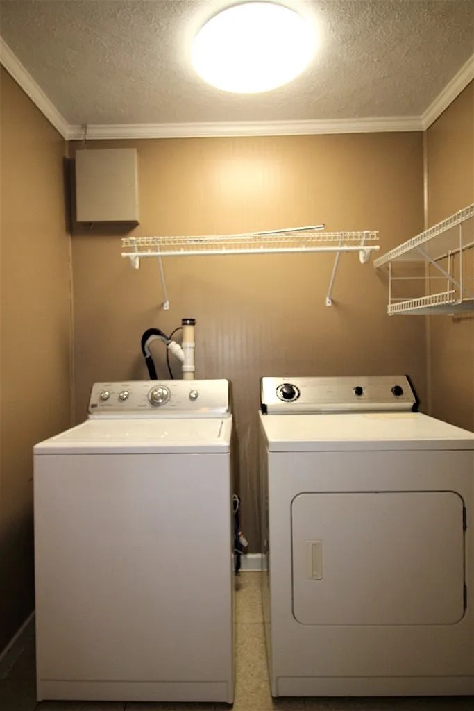 4317 Byron Street Columbus, GA 31907 - Photo 21 of 28 a utility room with dryer and washer