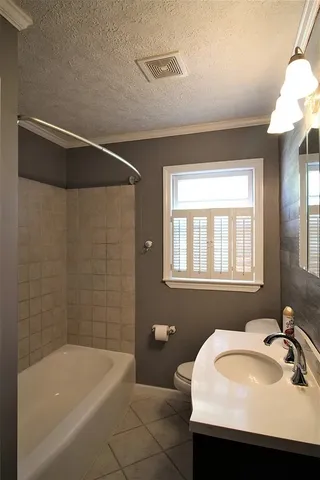 a bathroom with a sink and a bathtub