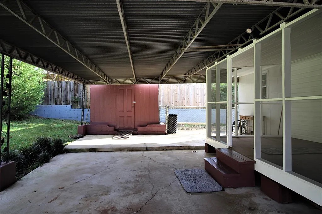 4317 Byron Street Columbus, GA 31907 - Photo 24 of 28 a view of backyard with tub