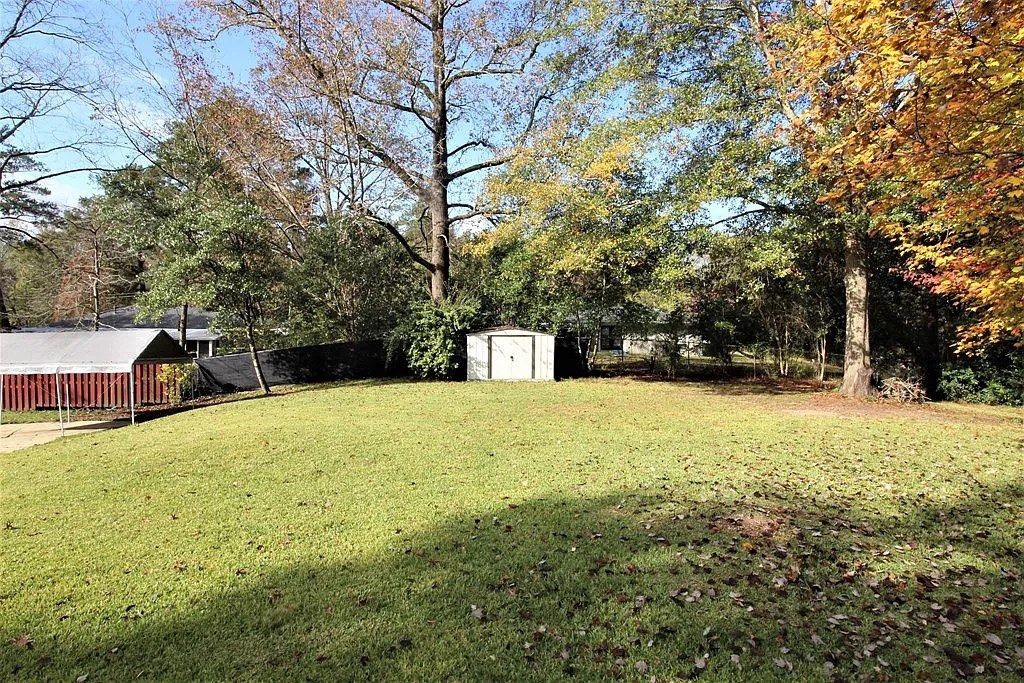 4317 Byron Street Columbus, GA 31907 - Photo 27 of 28 a house view with a trees