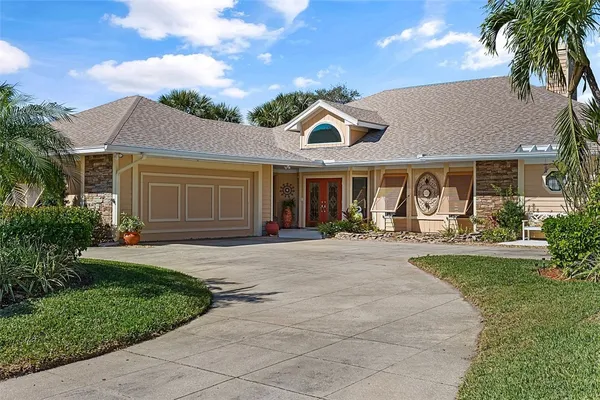 front view of a house with a yard