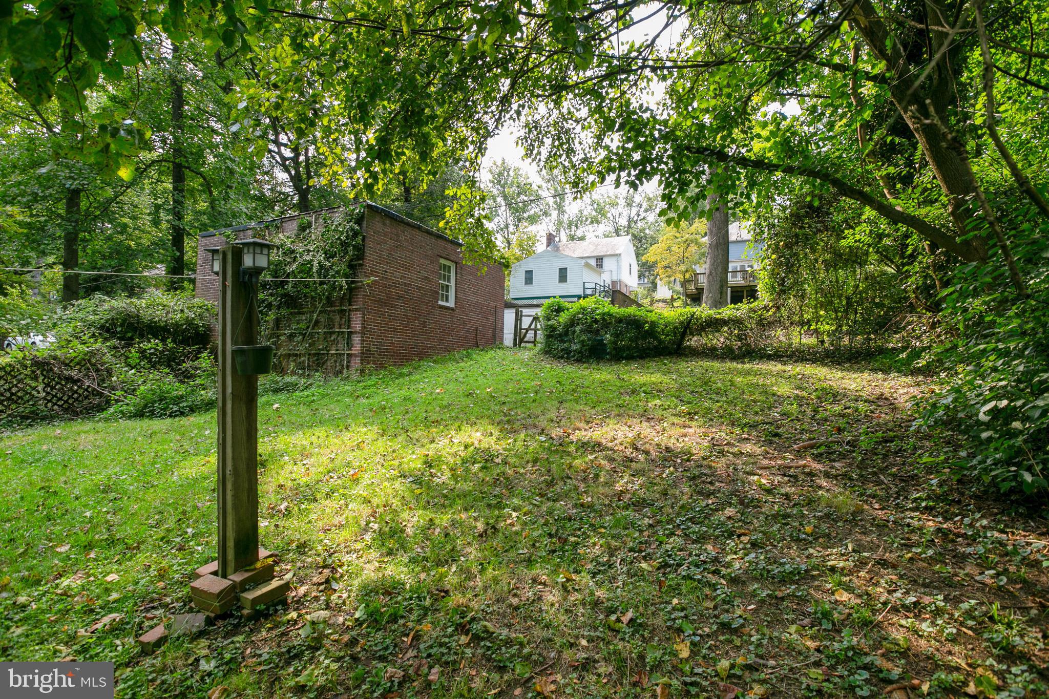 4619 Briarclift Road Baltimore, MD 21229 - Photo 31 of 39 Large rear yard leading to the garage