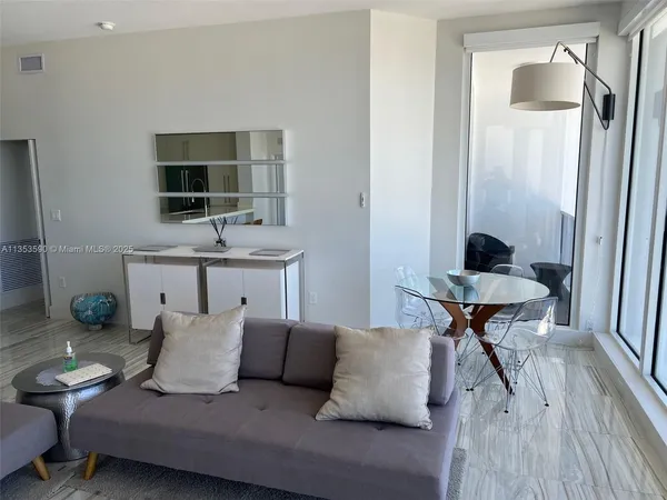 a kitchen with a sink a stove and a refrigerator