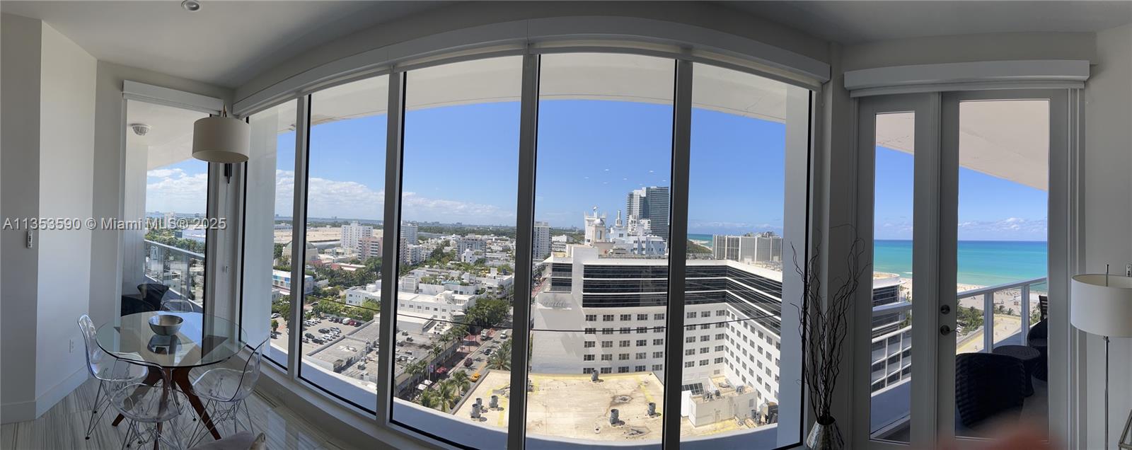 100 Lincoln Road, Unit PH9 Miami Beach, FL 33139 - Photo 2 of 83 a view of a city from a living room
