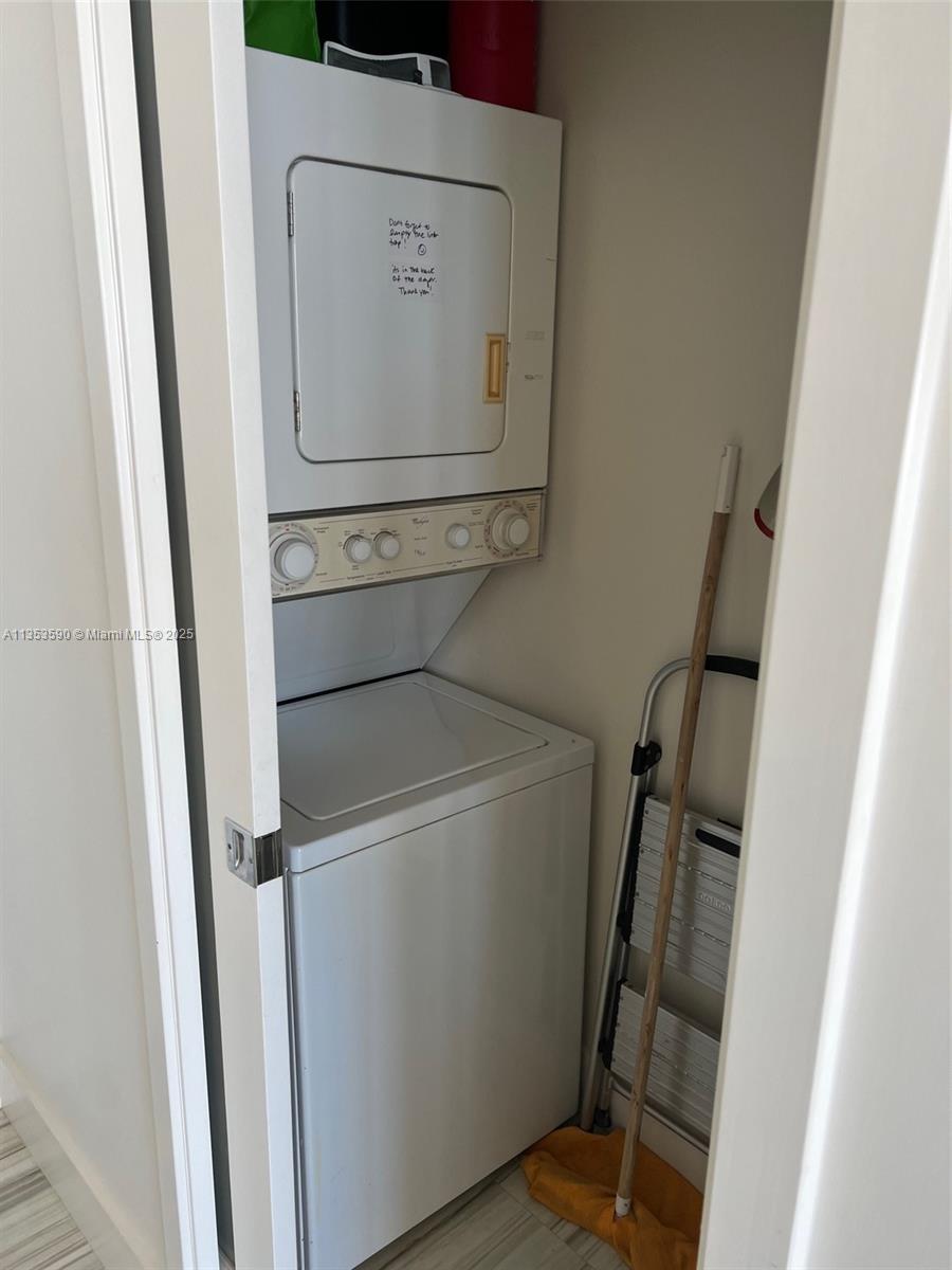100 Lincoln Road, Unit PH9 Miami Beach, FL 33139 - Photo 41 of 83 a utility room with dryer and washer