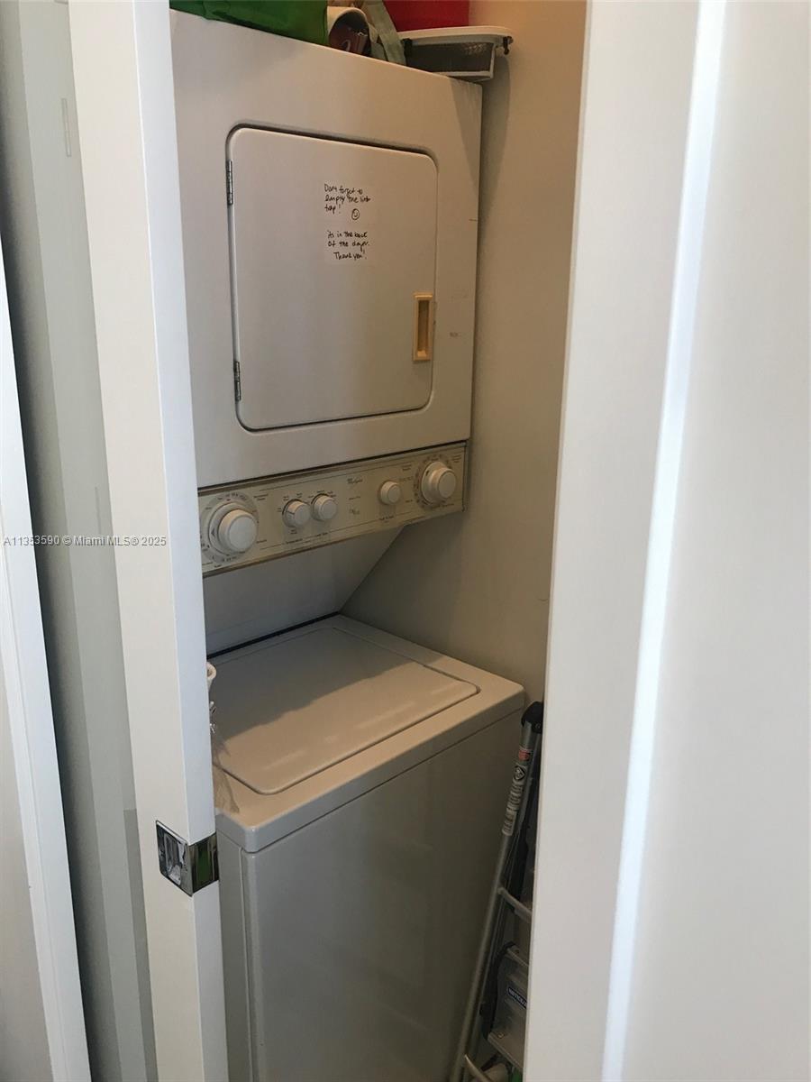 100 Lincoln Road, Unit PH9 Miami Beach, FL 33139 - Photo 42 of 83 a utility room with dryer and washer