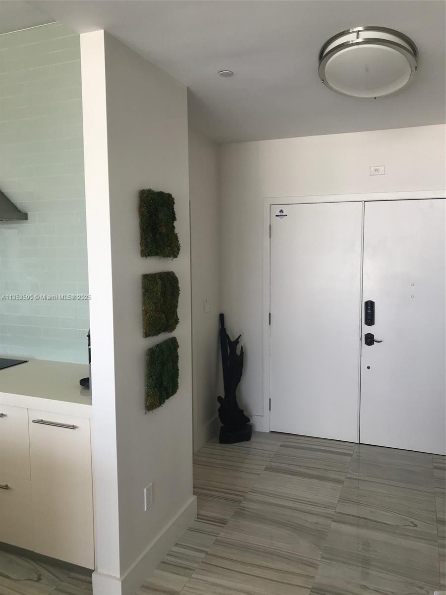 100 Lincoln Road, Unit PH9 Miami Beach, FL 33139 - Photo 44 of 83 a view of a room with wooden floor