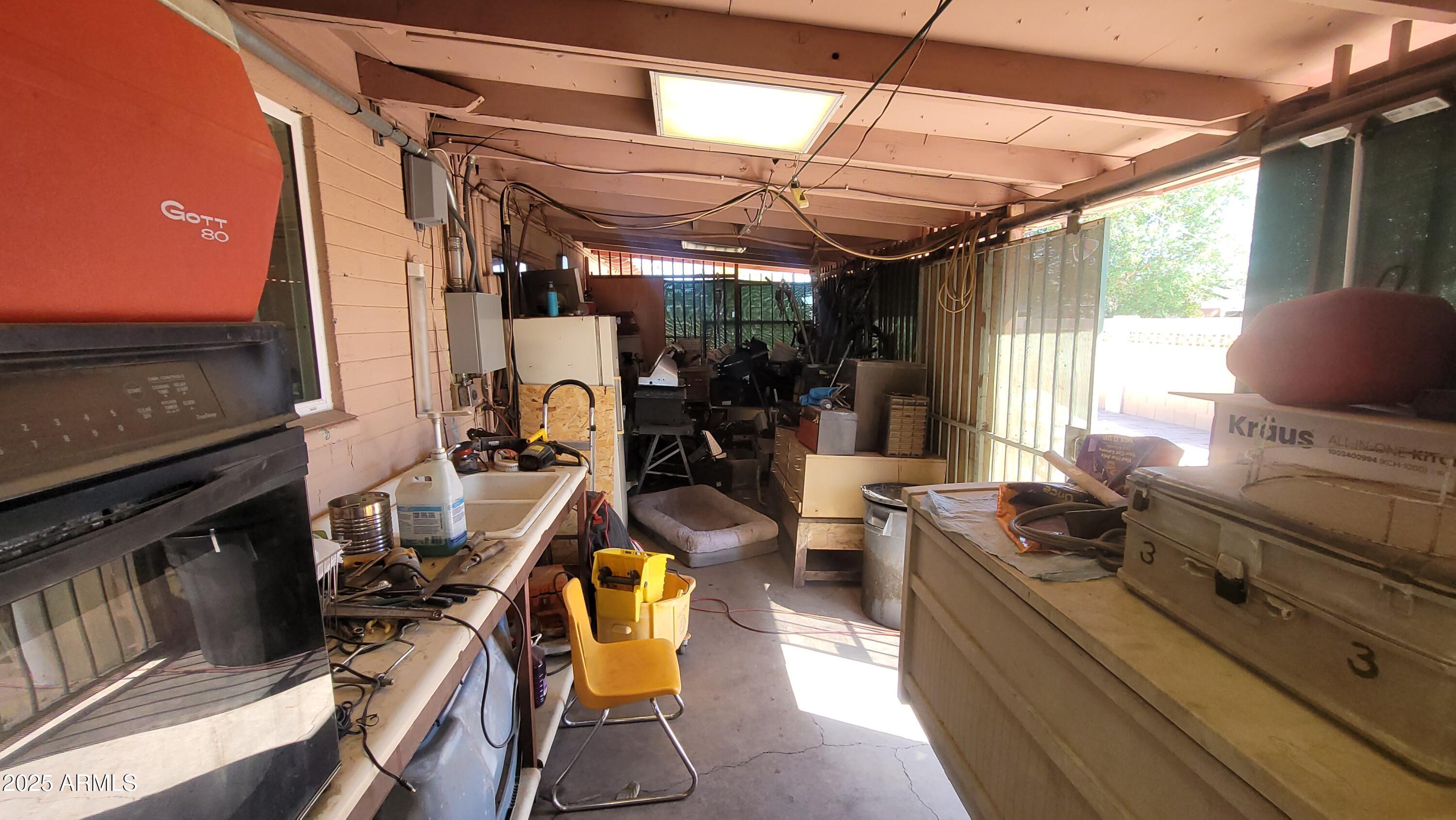 4315 West Osborn Road Phoenix, AZ 85031 - Photo 12 of 29 a view of a room with gym equipment