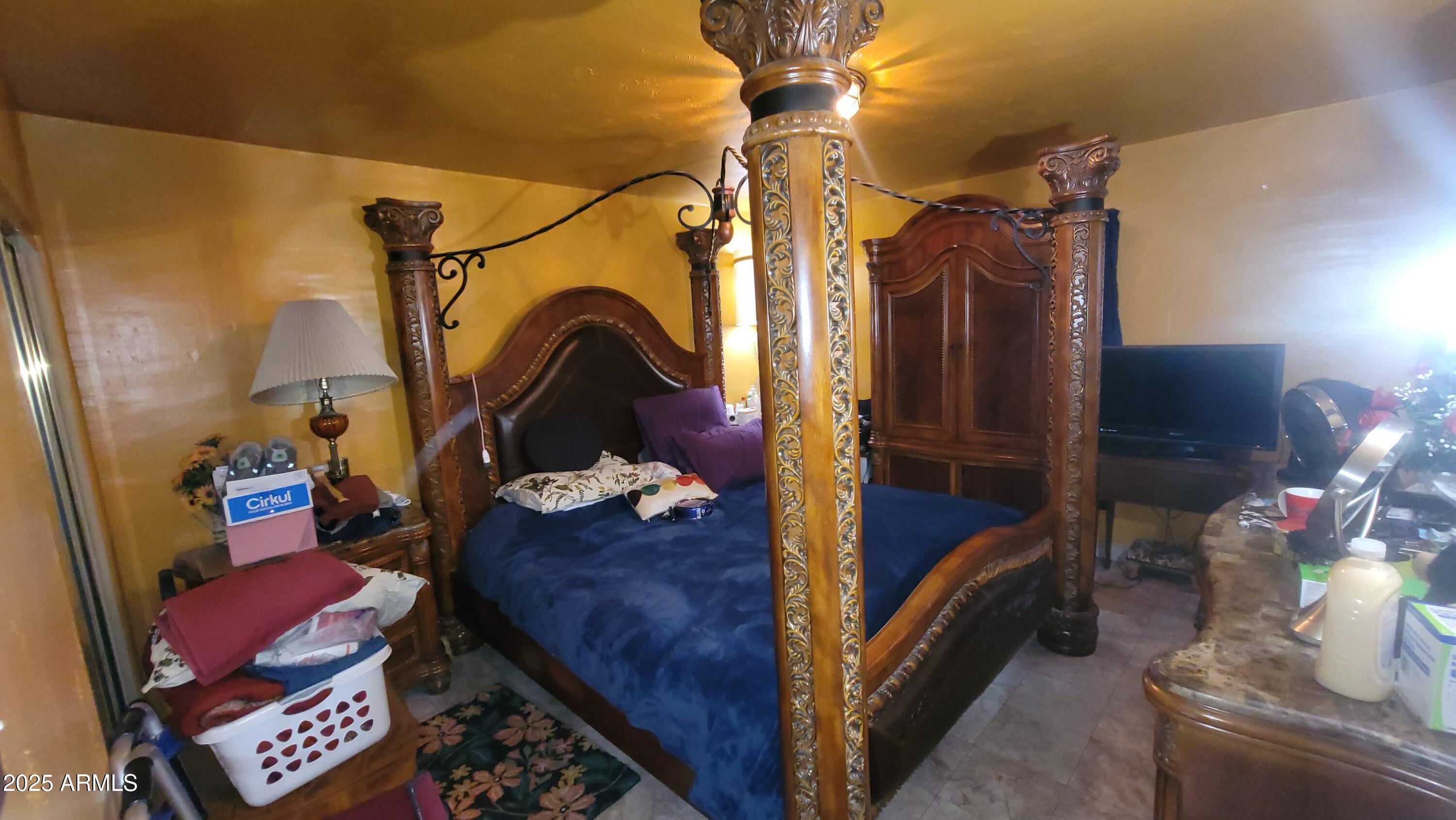 4315 West Osborn Road Phoenix, AZ 85031 - Photo 24 of 29 a view of living room kitchen and entryway