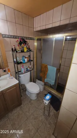 a kitchen with stainless steel appliances kitchen island granite countertop a sink and cabinets