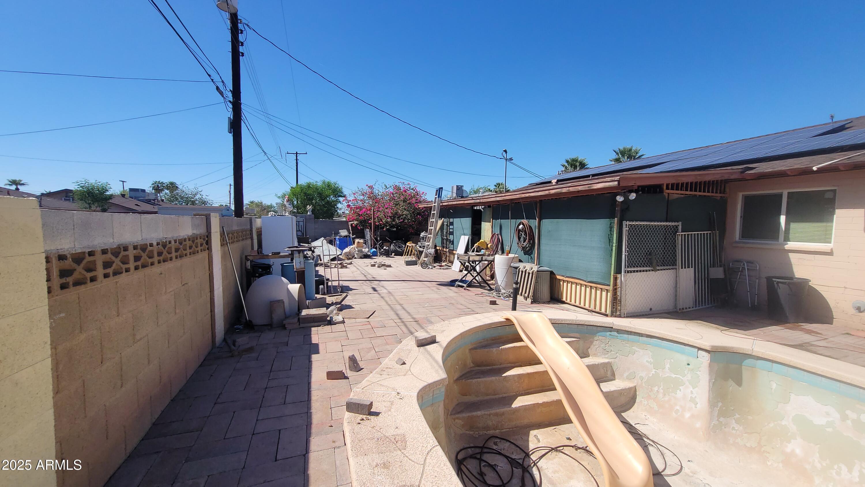 4315 West Osborn Road Phoenix, AZ 85031 - Photo 28 of 29 a view of swimming pool with seating space