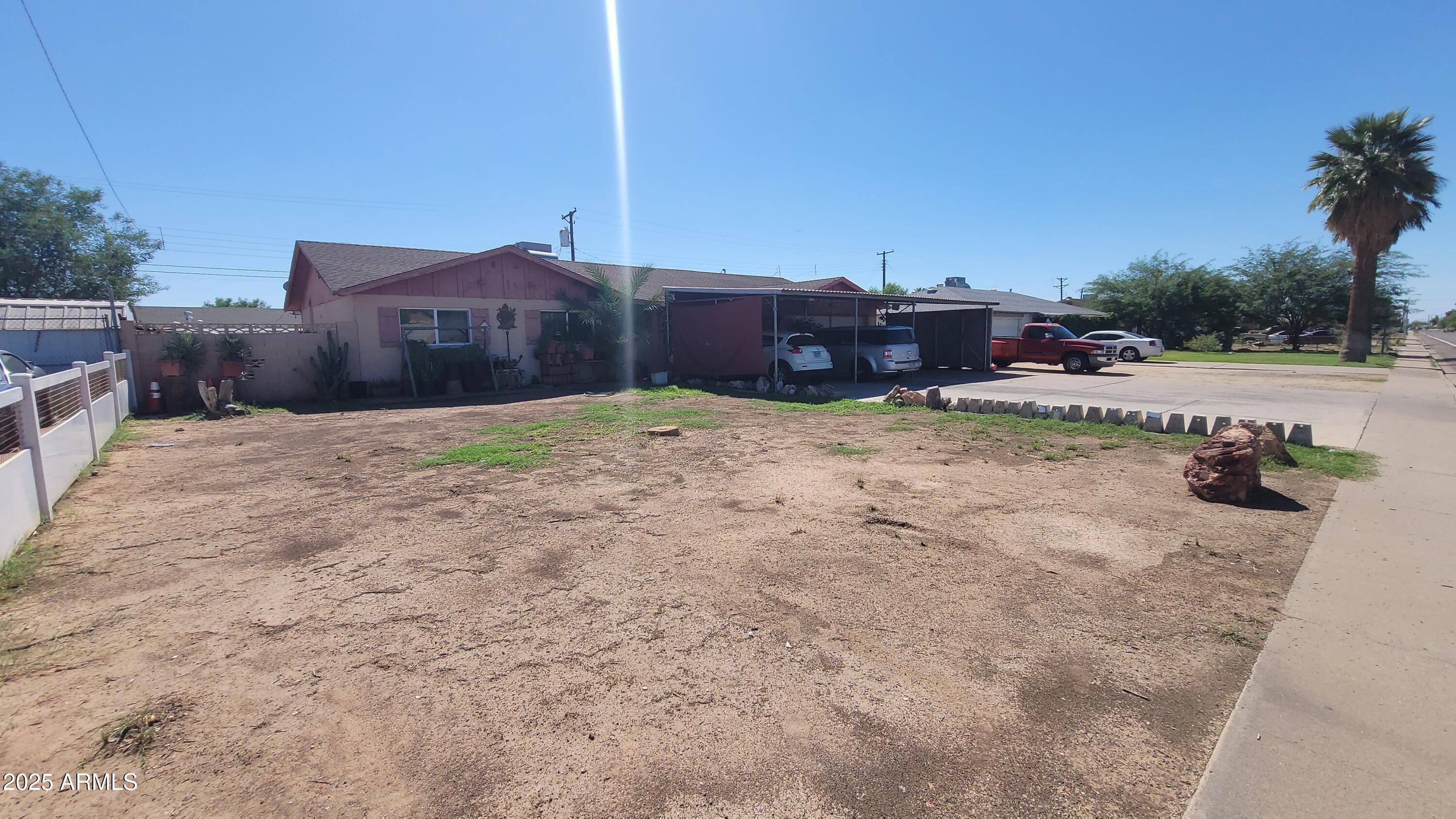 4315 West Osborn Road Phoenix, AZ 85031 - Photo 6 of 29 a car parked in front of a house