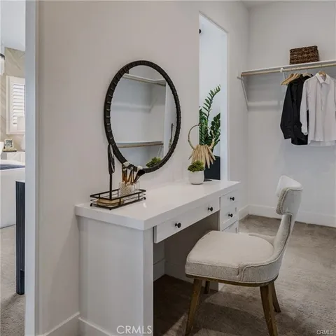 a bathroom with a sink a mirror and a toilet