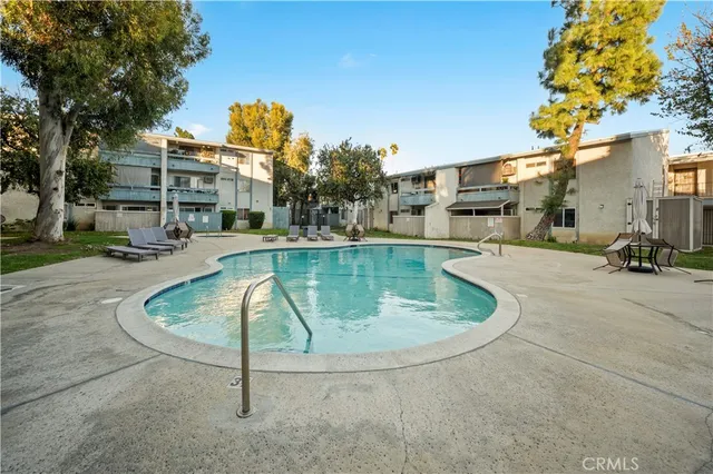 a view of outdoor space swimming pool and deck area