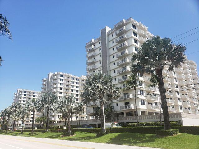 3215 South Ocean Boulevard, Unit 210 Highland Beach, FL 33487 - Photo 1 of 9 a view of a large building