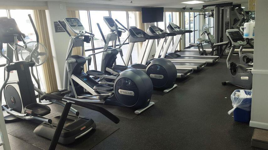 3215 South Ocean Boulevard, Unit 210 Highland Beach, FL 33487 - Photo 6 of 9 a view of a room with gym equipment