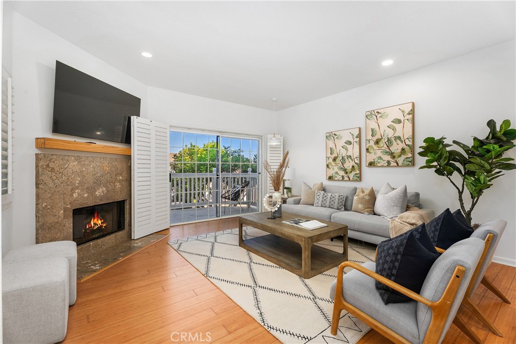 33113 Ocean Ridge Dana Point, CA 92629 - Photo 3 of 29 a living room with furniture and a fireplace