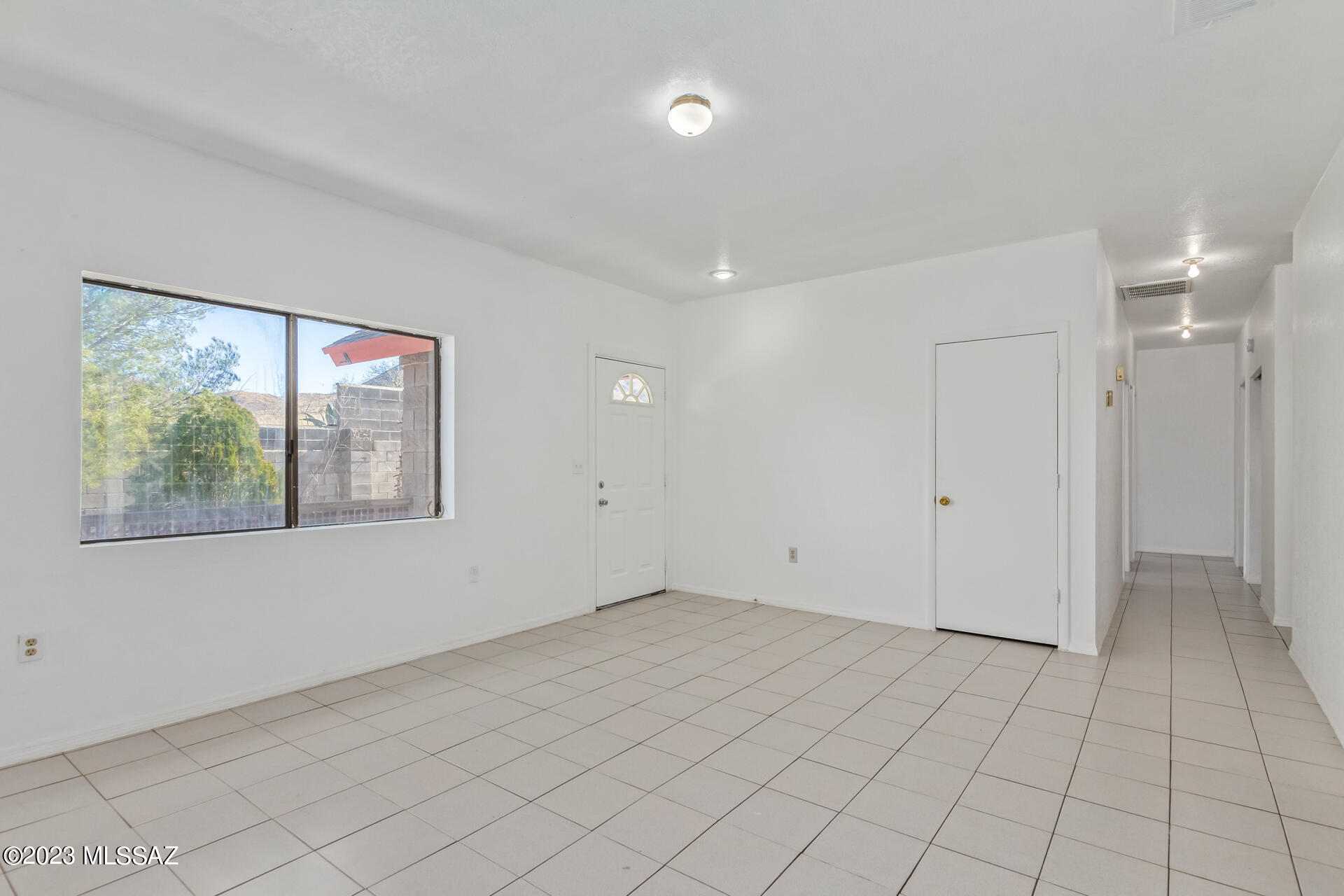 417 Dock Street Rio Rico, AZ 85648 - Photo 20 of 34 a view of an empty room with window