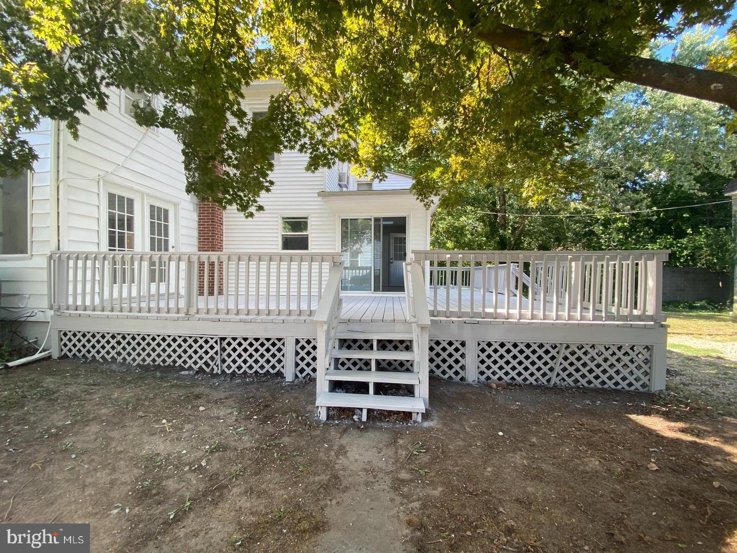 149 South Main Street, Unit 1 Elmer, NJ 08318 - Photo 14 of 14 a view of a bench in the back yard