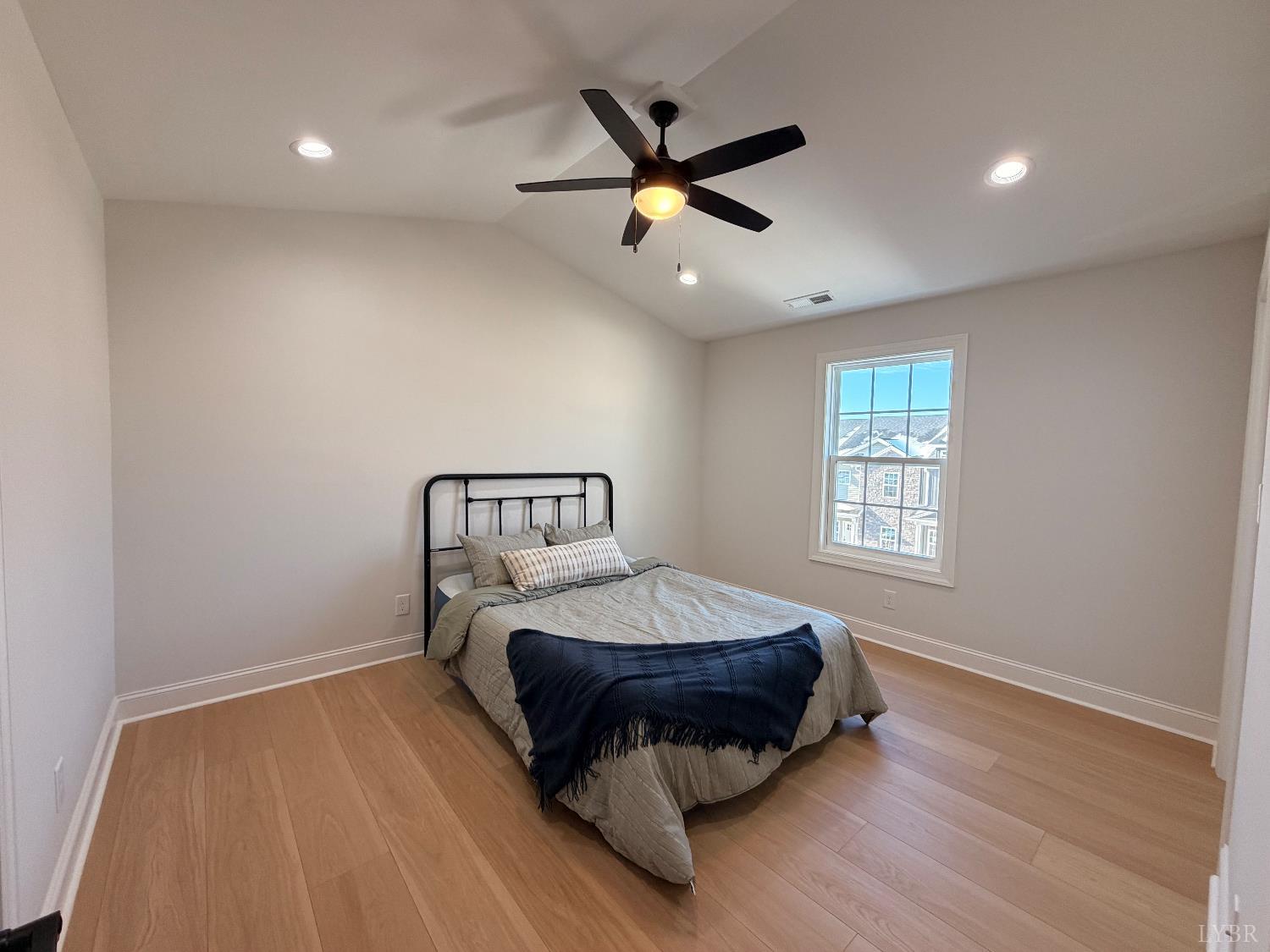 536 Leesville Road, Unit 207 Lynchburg, VA 24502 - Photo 19 of 35 a living room with a bed furniture and a window