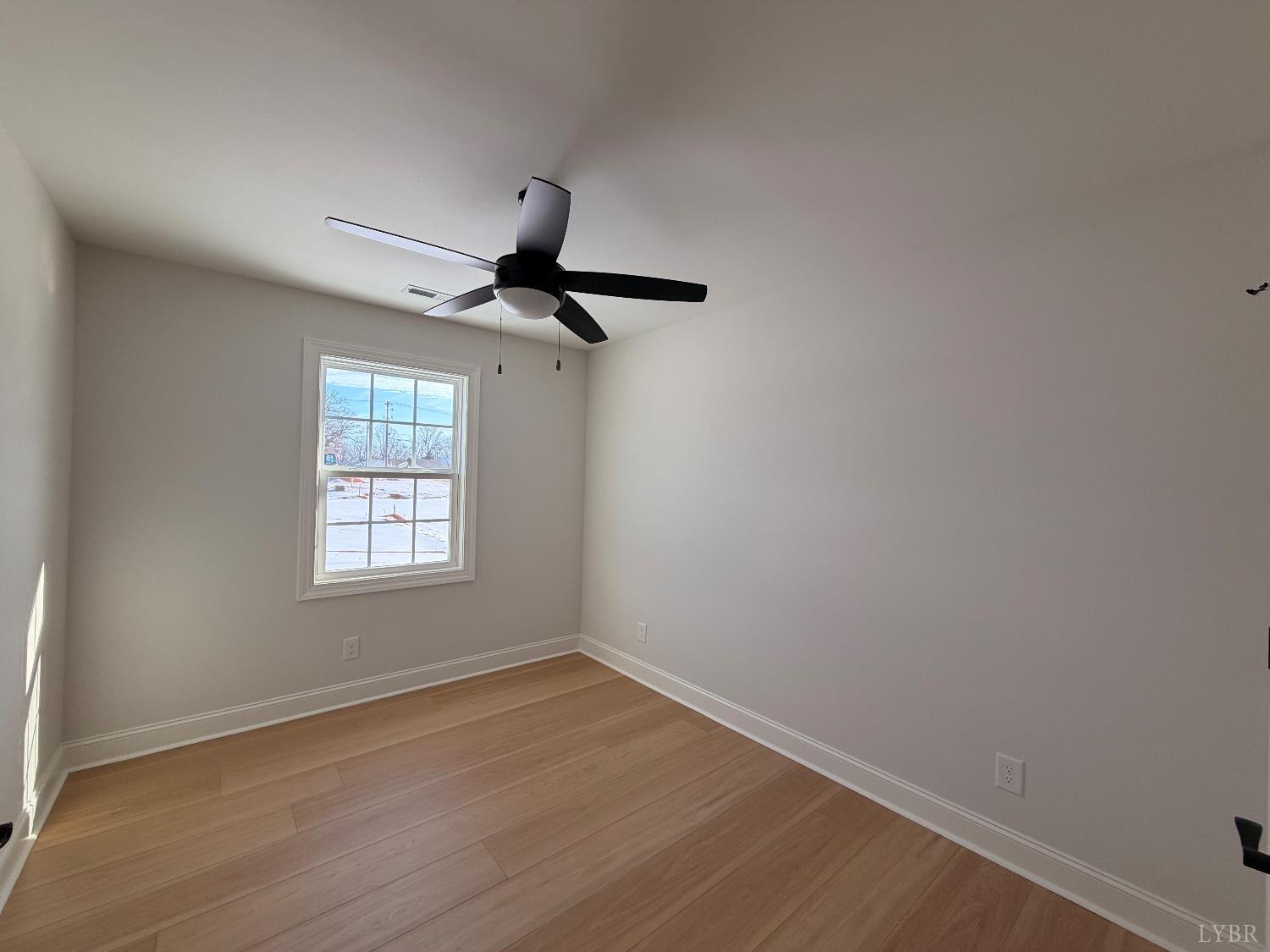 536 Leesville Road, Unit 207 Lynchburg, VA 24502 - Photo 28 of 35 a view of a room with a window and a ceiling fan