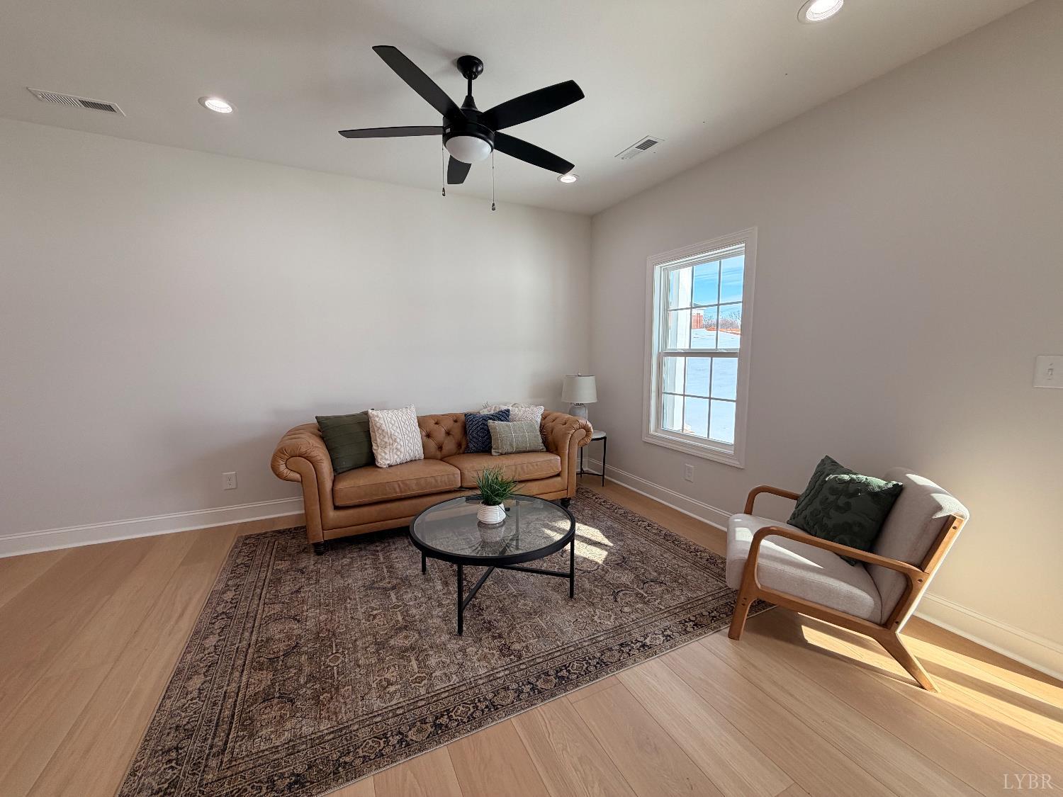 536 Leesville Road, Unit 207 Lynchburg, VA 24502 - Photo 31 of 35 a living room with furniture and a window