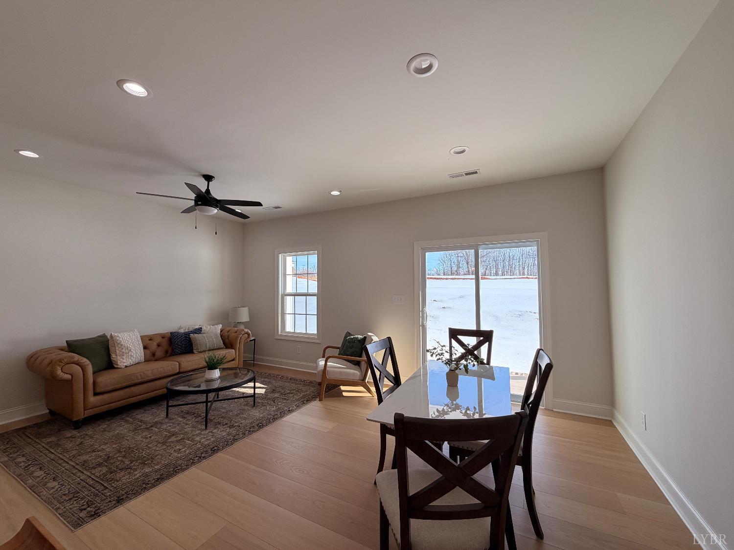 536 Leesville Road, Unit 207 Lynchburg, VA 24502 - Photo 34 of 35 a living room with furniture a rug and a window